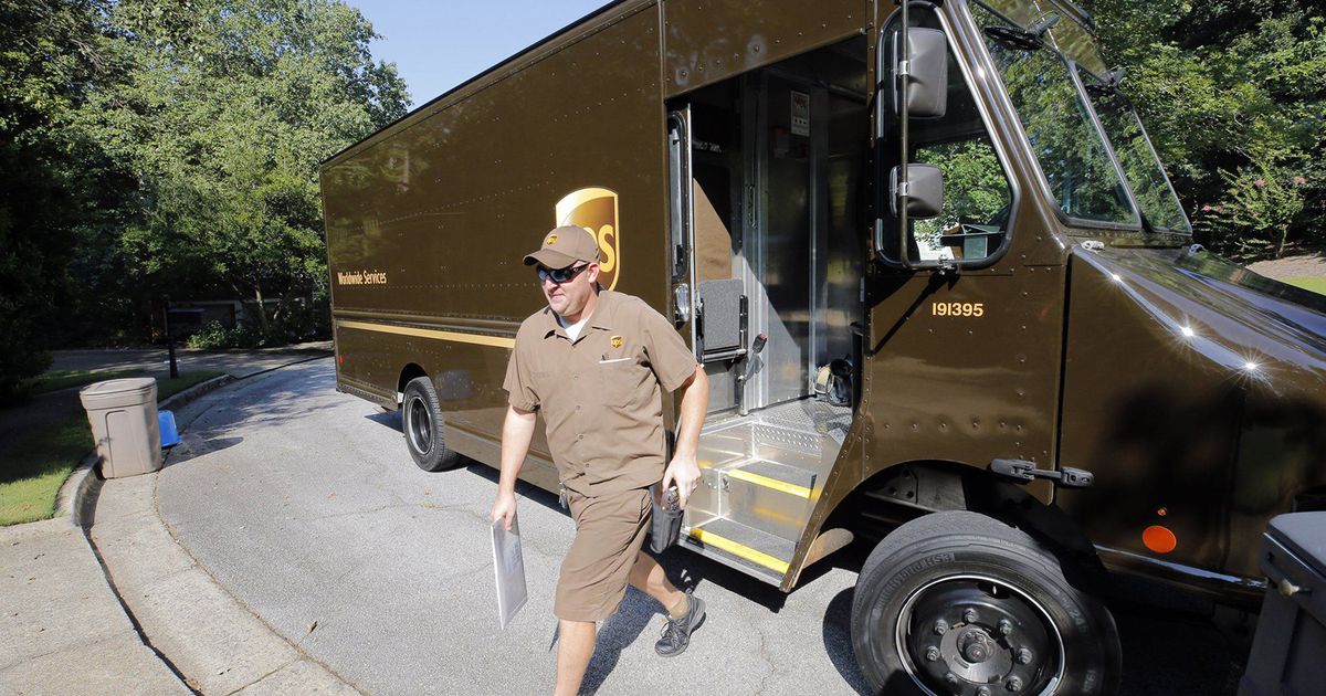 UPS cutting costs, revenue and profit decline with slower retail sales