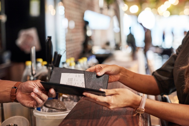Millions of Americans warned about illegal surcharges at restaurants that are driving up the bill – see how to avoid it
