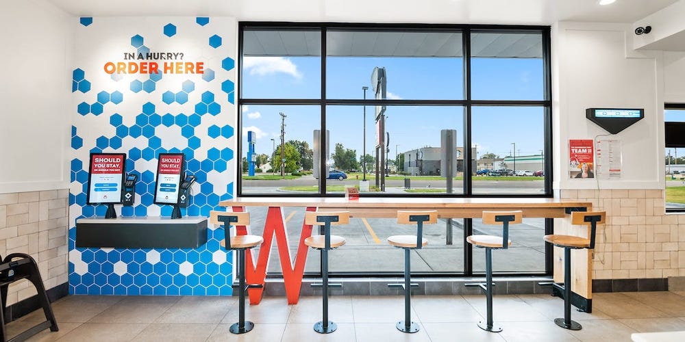 Take a look inside Wendy’s tech-focused new-look restaurants. To collect a mobile order you park in a dedicated spot and collect your food from a pickup shelf.