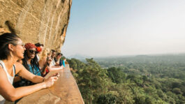 Image-Travelers-take-in-the-views-of-Sigiriya-Lion.jpeg