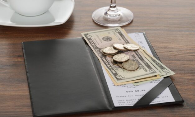 More restaurants adding service fees on checks