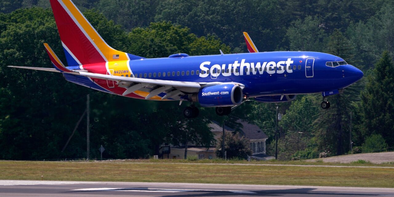 Southwest breaks with 50-year tradition and will assign seats; profit falls at Southwest, American