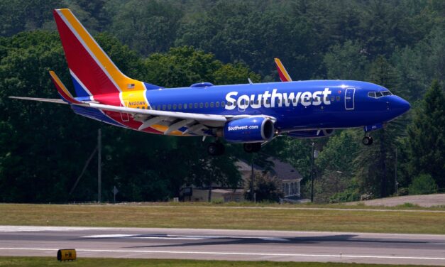 Southwest breaks with 50-year tradition and will assign seats; profit falls at Southwest, American