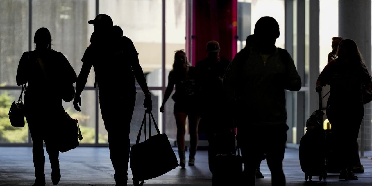 Airports, highways, beaches packed with travelers for Labor Day Weekend