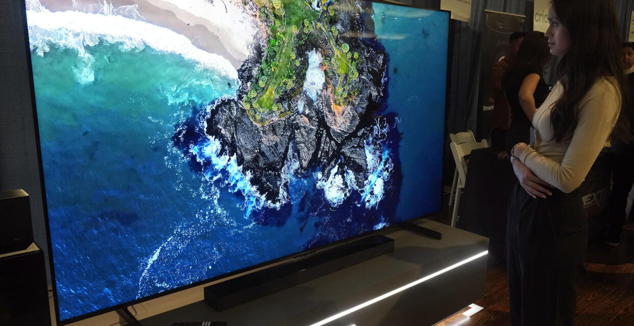 A TV as big as a bed? With the holidays approaching, stores stock more supersize sets