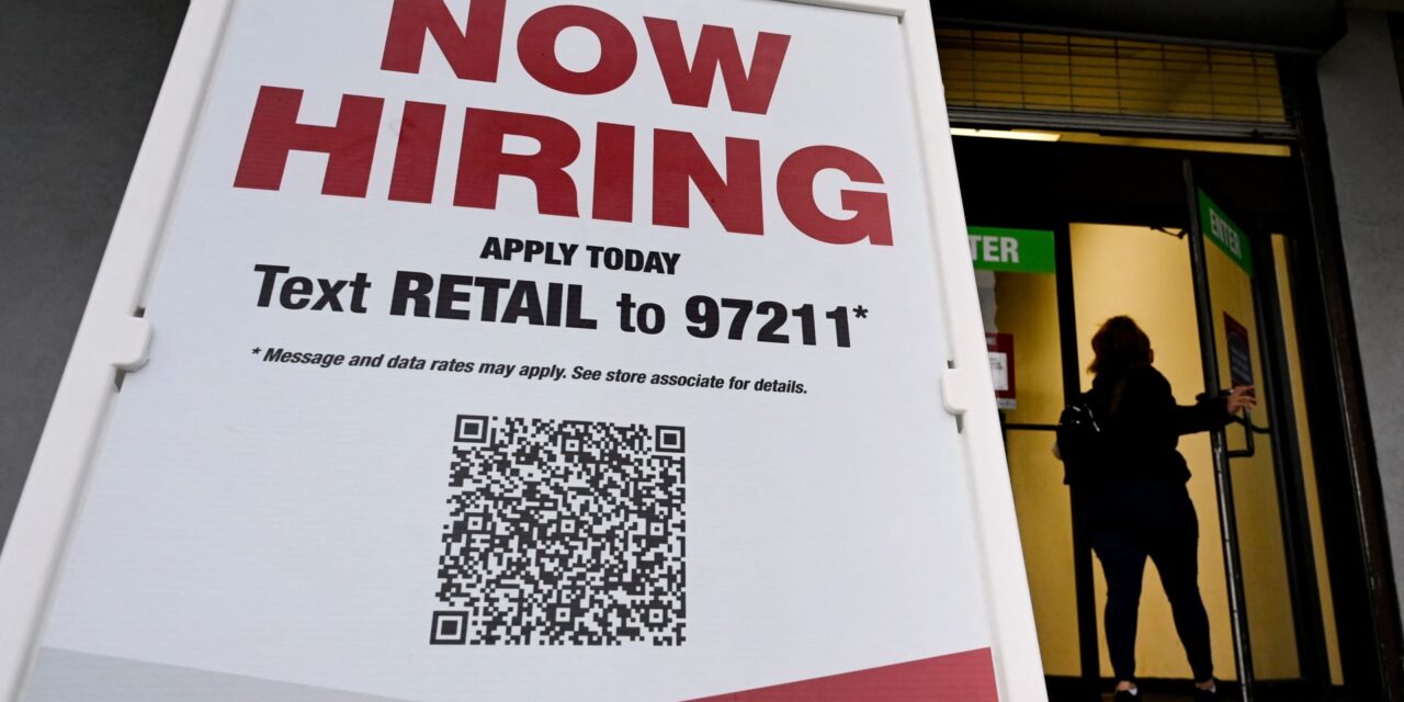 Jobs report: Retailers hire big, defying consumer warning signs
