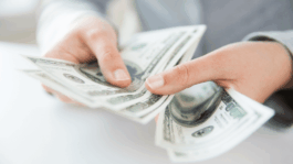 Hands-holding-money-Deposit-Photos.png