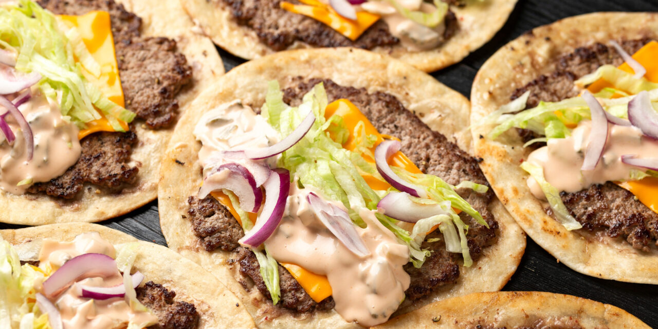 One Of The Best New Fast Food Items Of August 2026 Is A Burger Taco Hybrid
