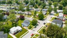 NAR Pending Home Sales Report Shows 2.3% Decrease in July Aerial view of Single-family homes