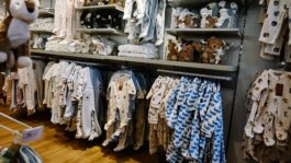 0bcdaf-20260915-baby-clothes-at-a-store-2000